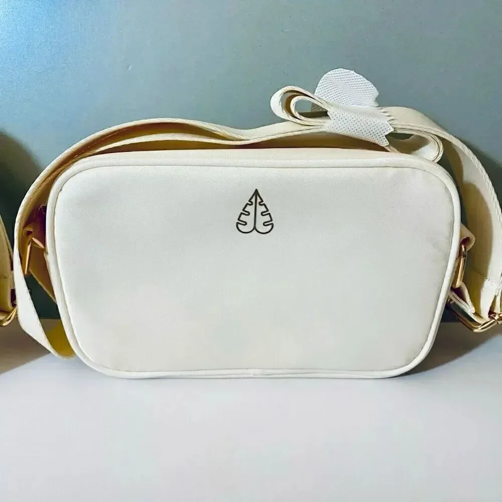 NWT Gorgeous Biossance White/ Ivory Satin Light Cushion adjustable crossbody bag